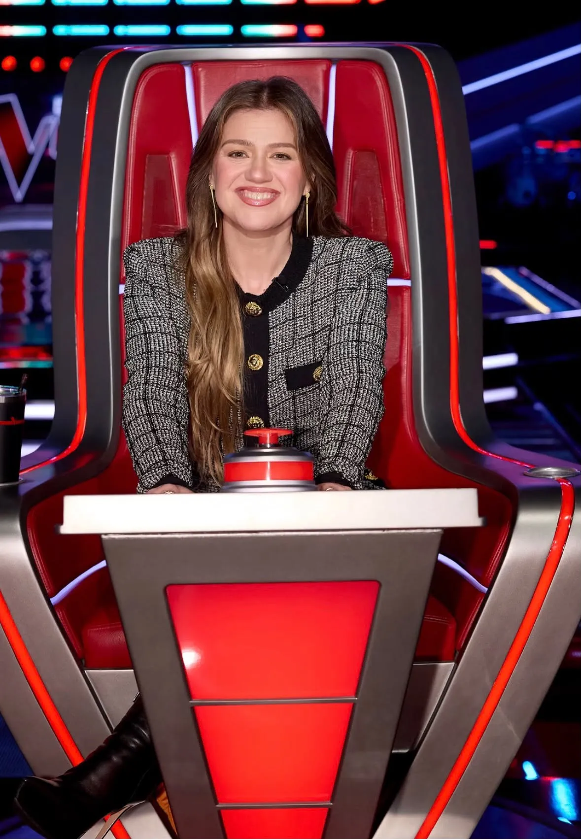 Kelly Clarkson in the coach's chair on The Voice