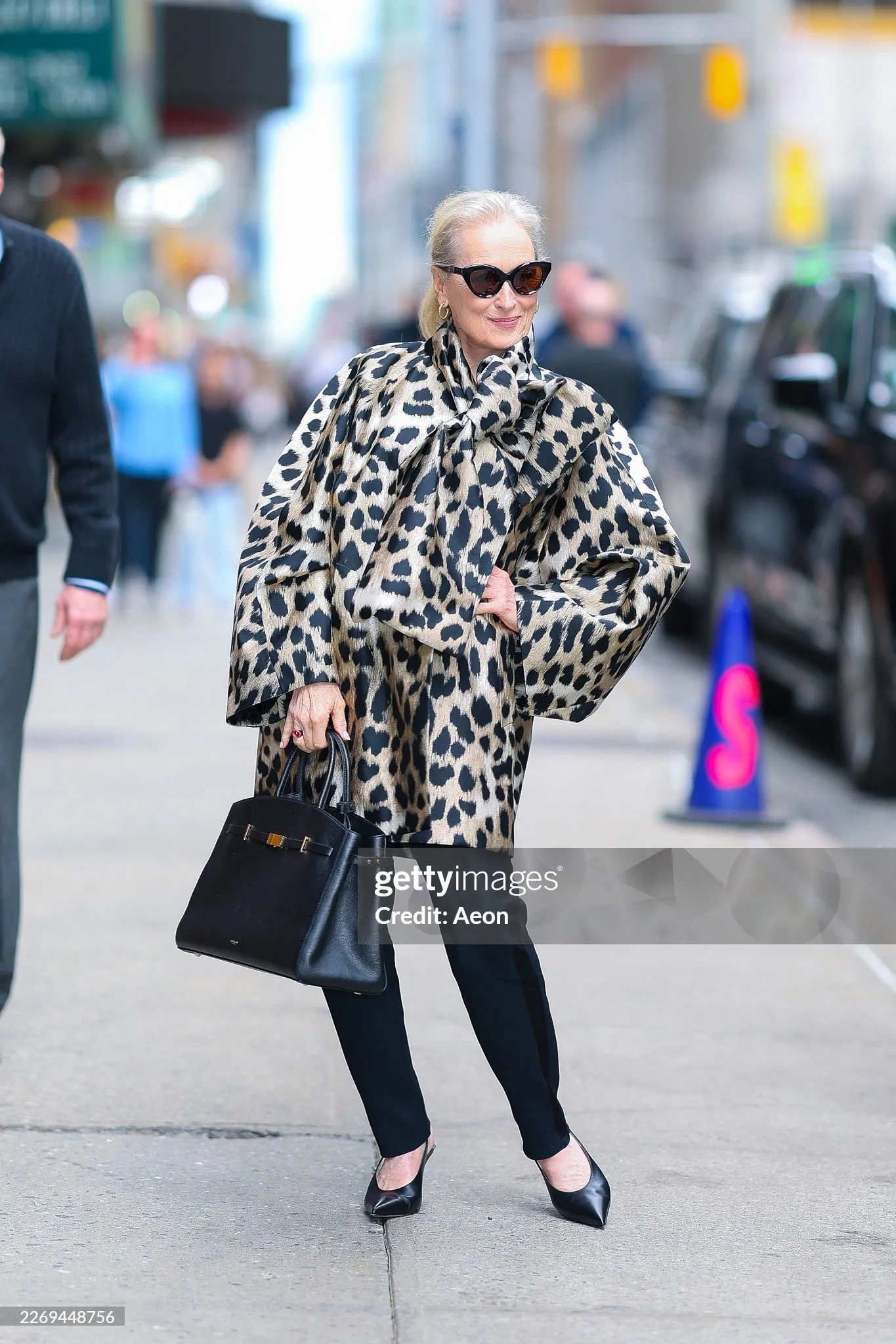 Meryl Streep in a leopard-print bow-neck jacket by Givenchy